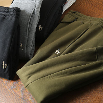 100% de algodão bordado Corredores de lã masculina com calças quentes acolchadas Calças para cintura média