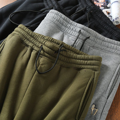 100% de algodão bordado Corredores de lã masculina com calças quentes acolchadas Calças para cintura média