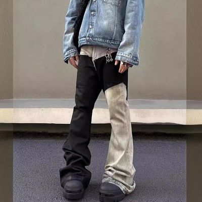 Mid Waist Denim Fabric Custom Lavado Limite de borda cruda Patchwork Calças Flared Jeans Para Homens